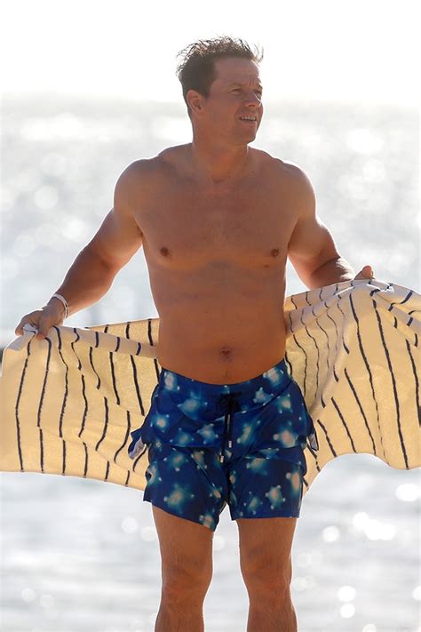 mark wahlberg shows off his rock hard abs in hawaii pics