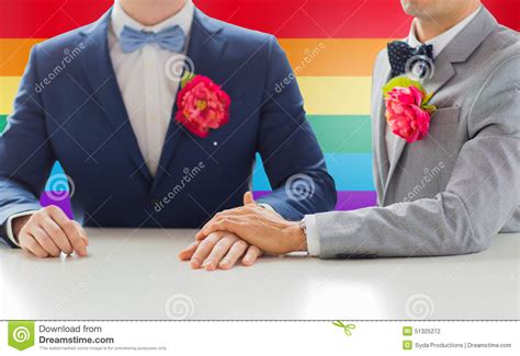 Close Up Of Happy Male Gay Couple Holding Hands Stock