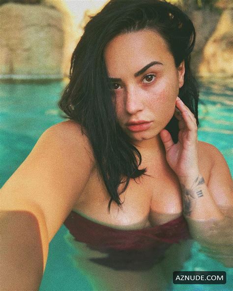Demi Lovato Took A Few Sexy Photos Posing In The Pool In A One Piece