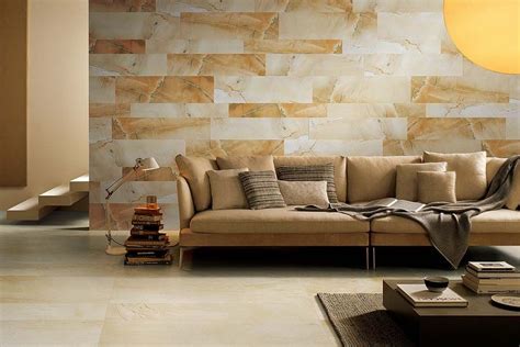 beautiful living room wall tiled  warm toned sandstone effect