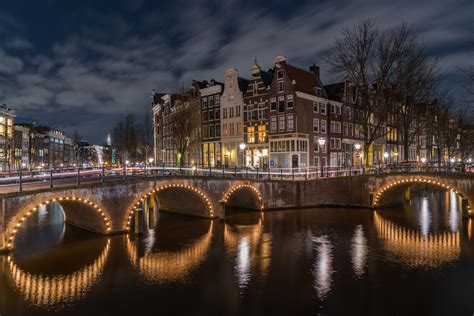 amsterdam netherlands houses bridges canal night street lights