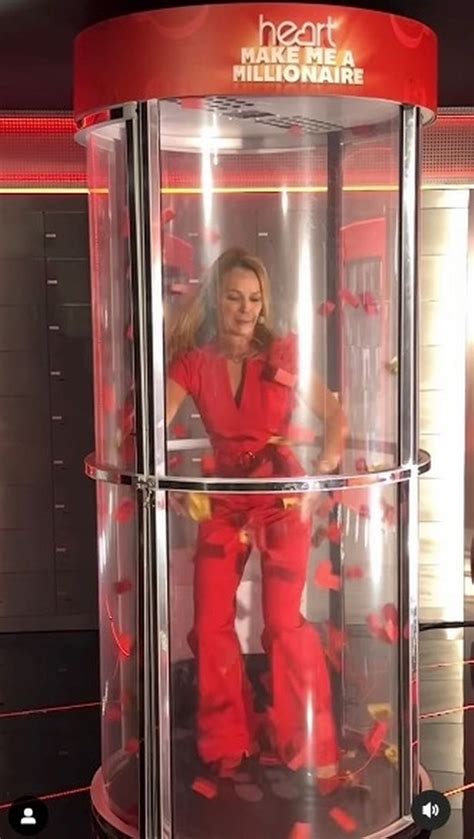 red hot amanda holden shows off her famous curves in tight red jumpsuit