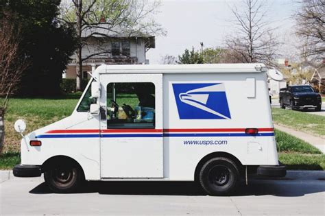 postal worker charged  stealing mail