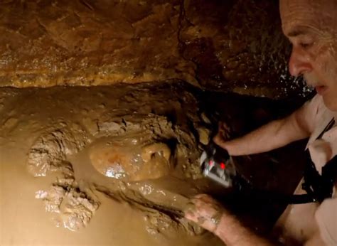 flooded egyptian tomb stuns archaeologists as they drain