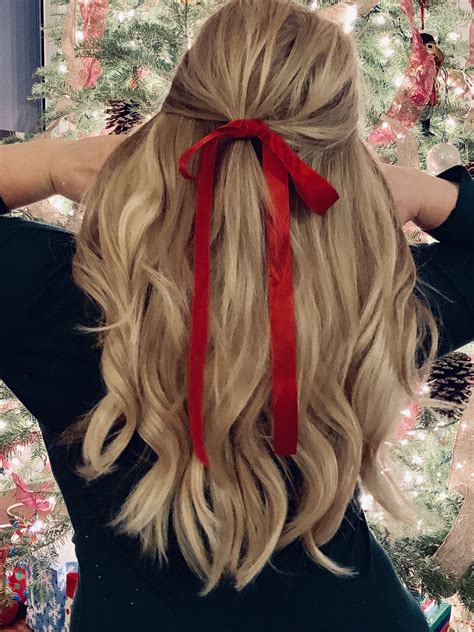 red ribbons are the perfect way to create a festive holiday hairstyle
