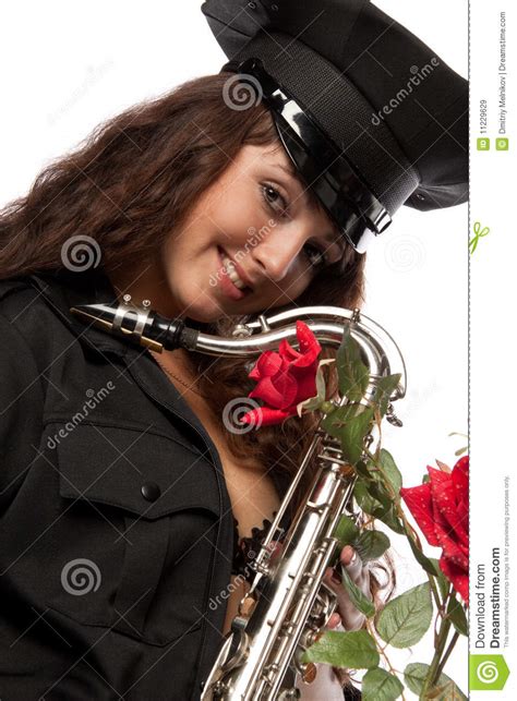 Sexy Security Guard With Saxophone Royalty Free Stock