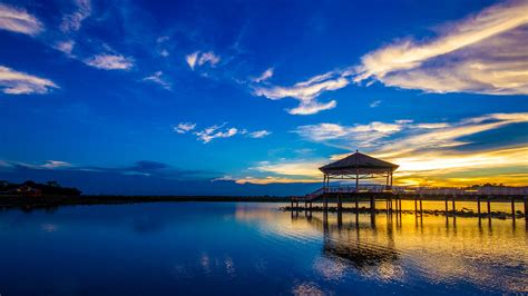 sunset twilight   reservoir  pavilion bueng  fai phichit thailand windows