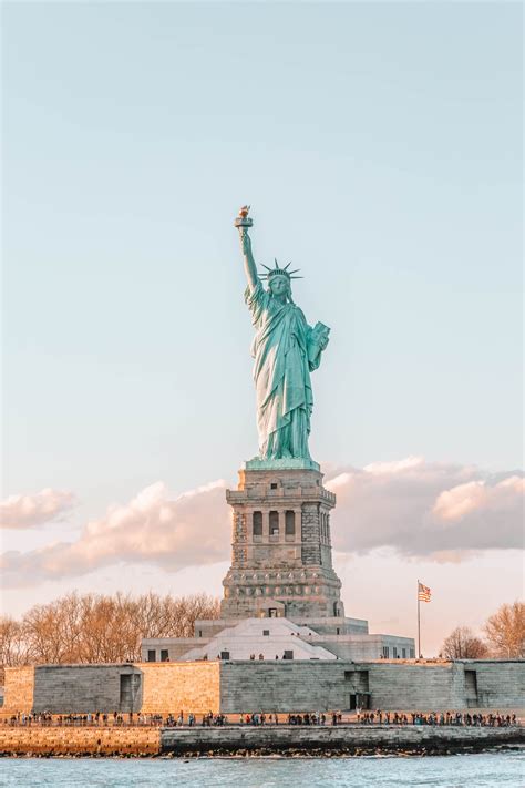 visiting  statue  liberty  york city hand luggage