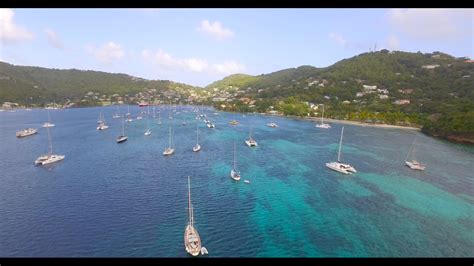 aerial stock drone footage  sailboats  harbor bequia