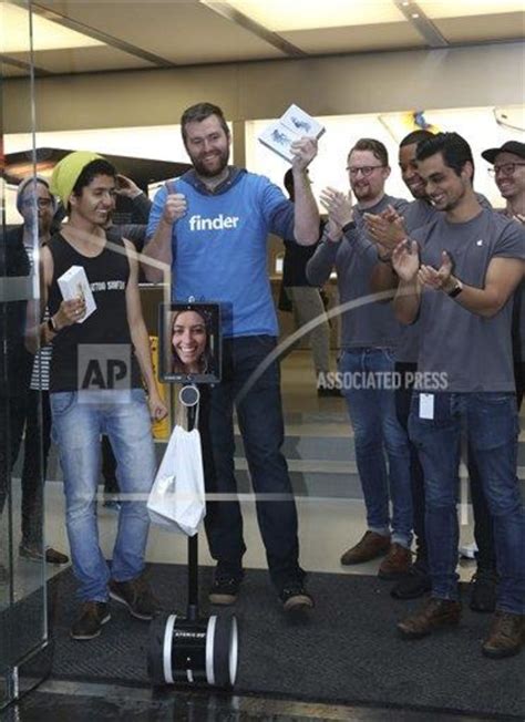 iphone  shoppers  smiles  rain  apple store opens