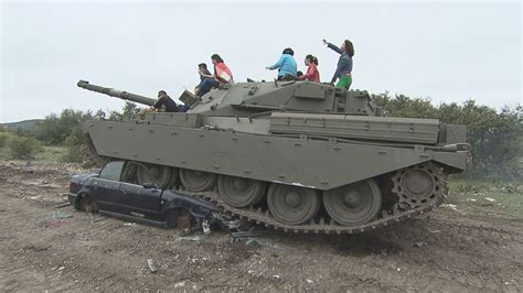 texas company lets  spend spring break driving real tanks firing rounds  blowing