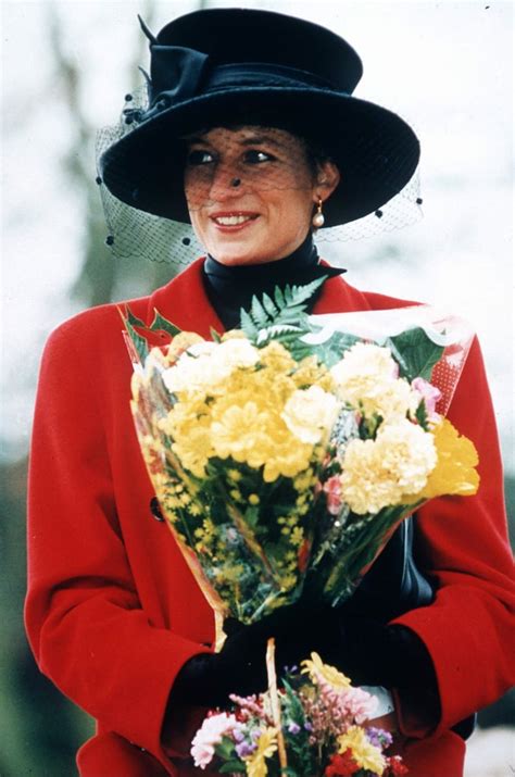 princess diana in 1993 in a black hat with bangs and heavy eyeliner