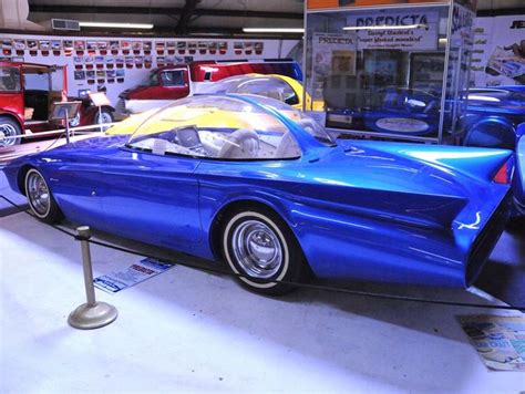 blue sports car   display   museum