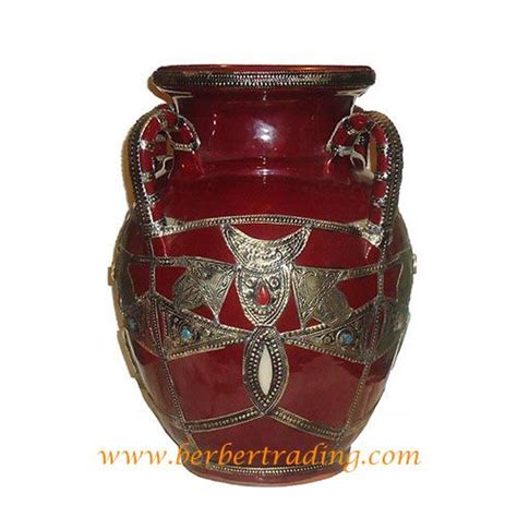 red vase  intricate designs   bottom  sides sitting   white background