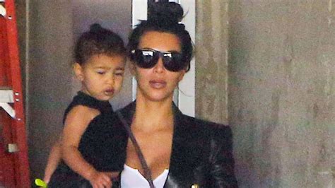 north west is not happy being awoken from a nap on her way to armenia