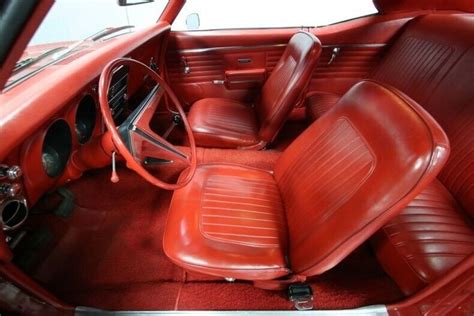 classic vintage chrome hideaway headlights red vinyl interior white stripe chevy classic