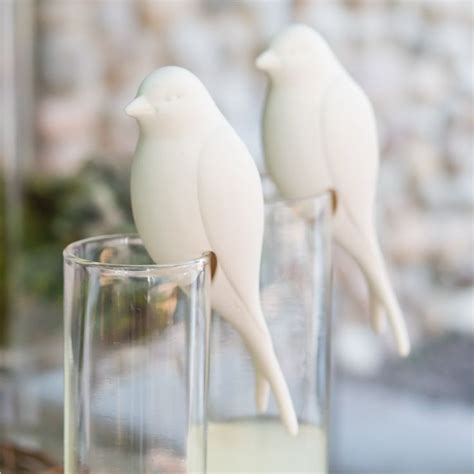 perching white ceramic bird