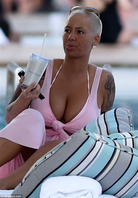 Amber Rose Flashes Cleavage During Miami Beach Getaway Daily Mail Online