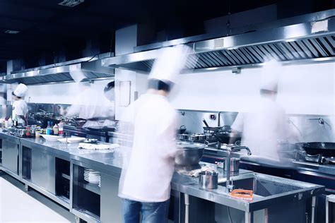 modern hotel kitchen  busy chefs axon underwriting