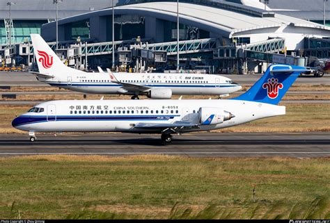 china southern airlines comac arj  photo  zhou qiming id  planespottersnet