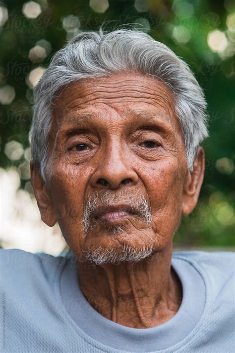 portrait of asian old man by chalit saphaphak