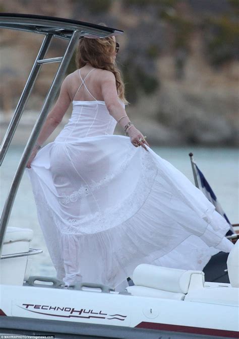 Mariah Carey Goes Underwear Free In A Sheer White Gown