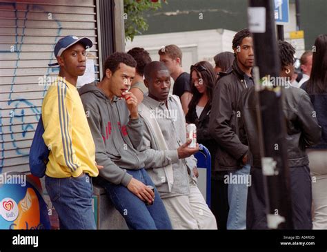group  young people hanging  street corner   streets