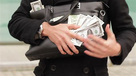 man holding bag full  money concept  stock footage sbv  storyblocks