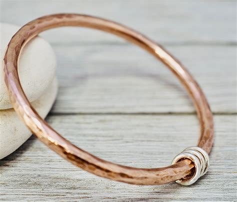 heavy copper bangle with silver detail hammered copper stacking