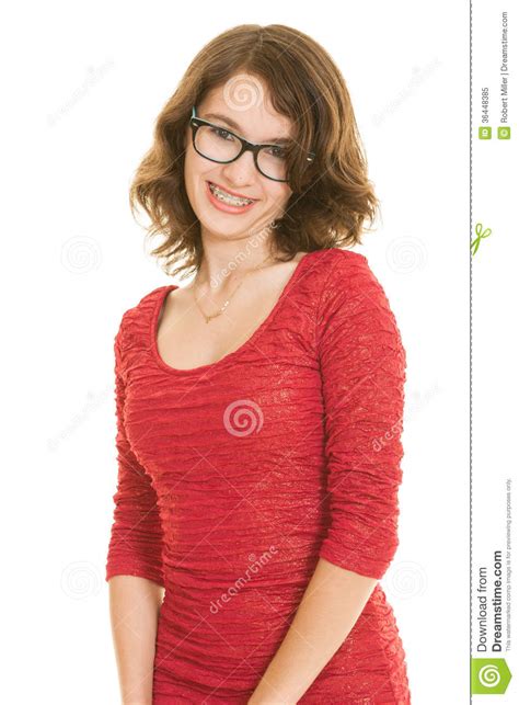 pretty teenage girl with braces in red dress smiling