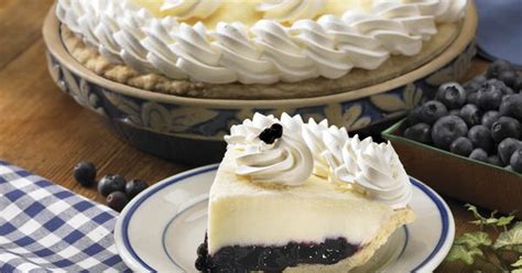double cream blueberry pie creamy vanilla custard and sour cream top a bed of savory