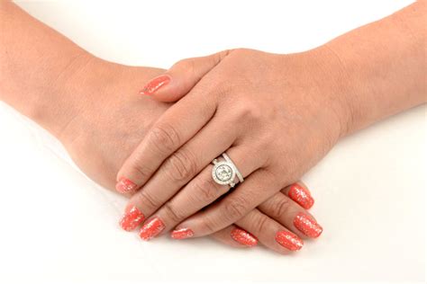 wear  engagement ring   wedding day