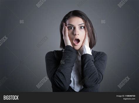 excited woman looking surprised image and photo bigstock