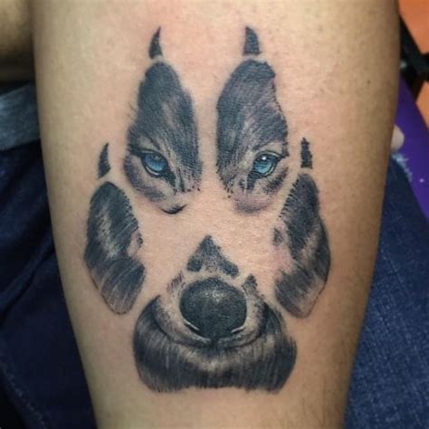Pin By Hamdi On Tattoo Wolf Print Tattoo Wolf Paw Tattoos Pawprint
