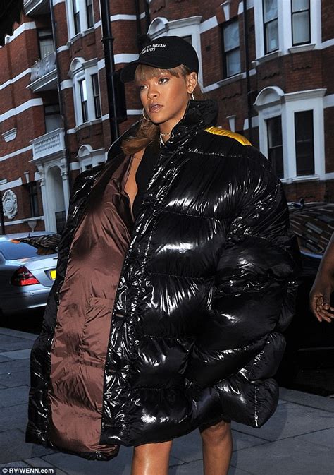 rihanna hits up london s harrods in large puffy coat after being booed by belgian fans daily