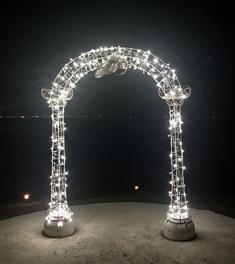 arch wrapped  twinkly lights  north   view  lights