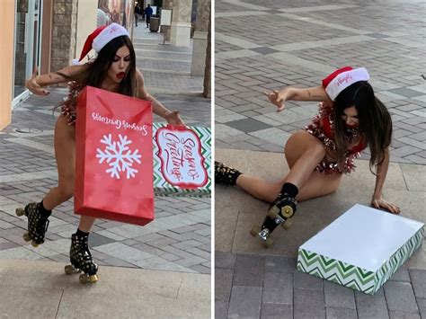 liziane gutierrez takes a spill on skates in christmas bikini