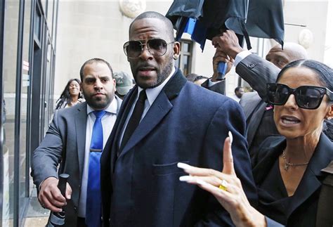 R Kelly Charged With Engaging In Prostitution Soliciting