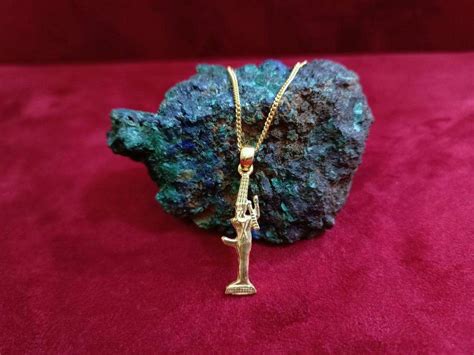 sexuality and fertility ancient egyptian god min necklace 18k gold