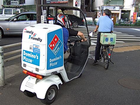 dominos pizza hut introduce  contact delivery service  japan  coronavirus fears