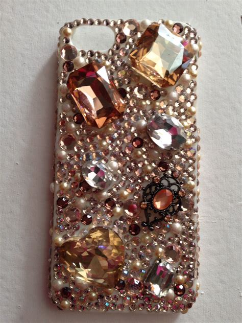 iphone case  lots   colored stones  pearls   front sitting   white