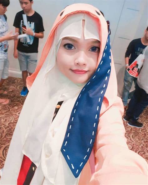 woman uses her hijab to capture the essence of anime cosplay