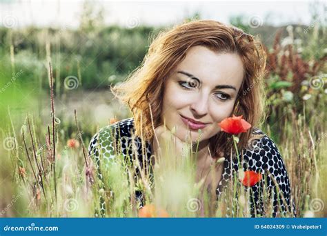 Beautiful Caucasian Woman Posing With Poppy Flowers Field Summer Time