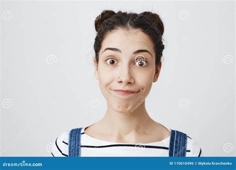 Close Up Portrait Of Funny Attractive Caucasian Woman With Two Buns