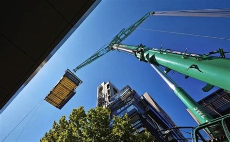 story prefab apartment tower  installed    days inhabitat green