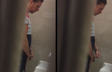 this guy plays with foreskin at a public urinal spycamfromguys hidden cams spying on men