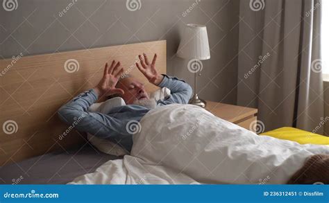 Handsome Bearded Mature Male Waking Up Opening Eyes While Lying In
