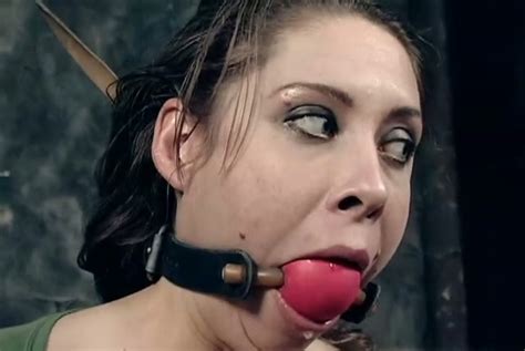 Laura Gets Her Mouth And Cunt Fucked With A Dildo In Bdsm