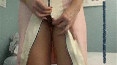 fetish sex latex nurse gives herself a pelvic exam with