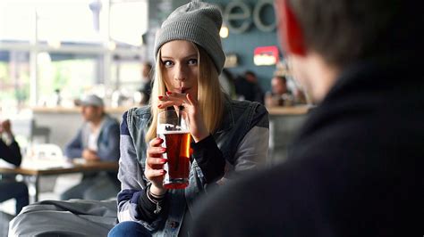 hipster girl drinking beer in restaurant stock footage sbv 309006878
